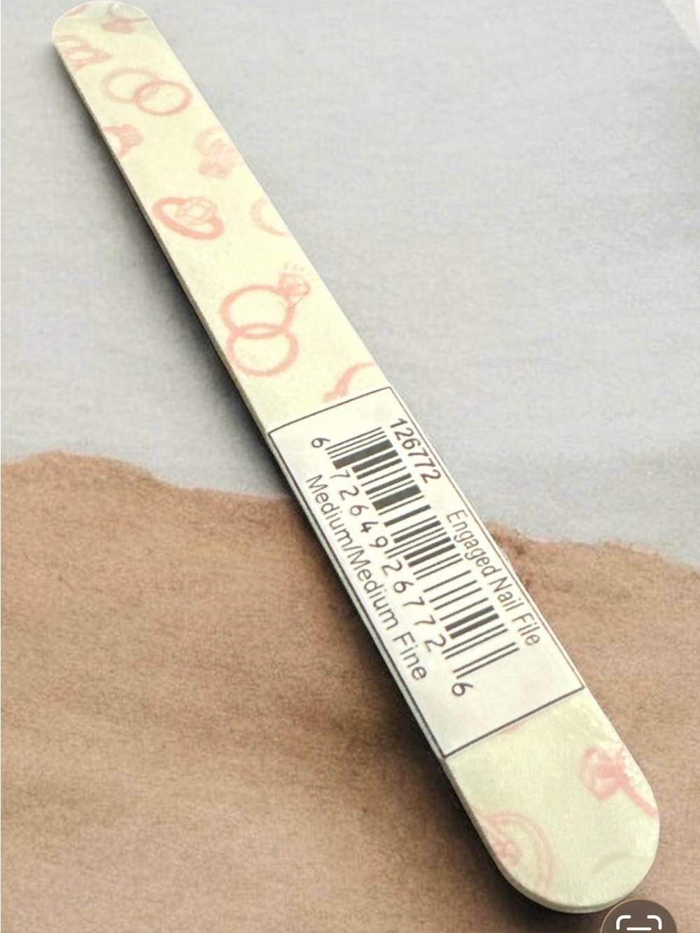 Peach Glitter Nail File - "Does this ring make me look engaged?"
2085A - Picture 5 of 5